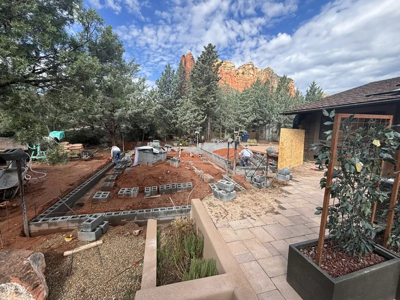 Foundation and block work laid for the addition with Sedona red rocks behind