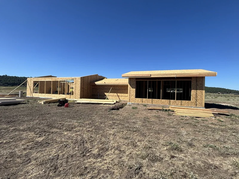 Framing under a clear blue Flagstaff sky